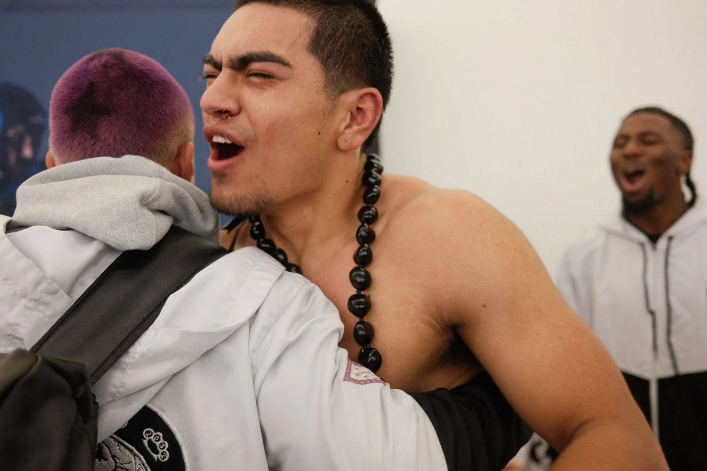 Two people sharing an embrace at a TCB competition